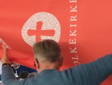 Mand og Folkekirkens logo