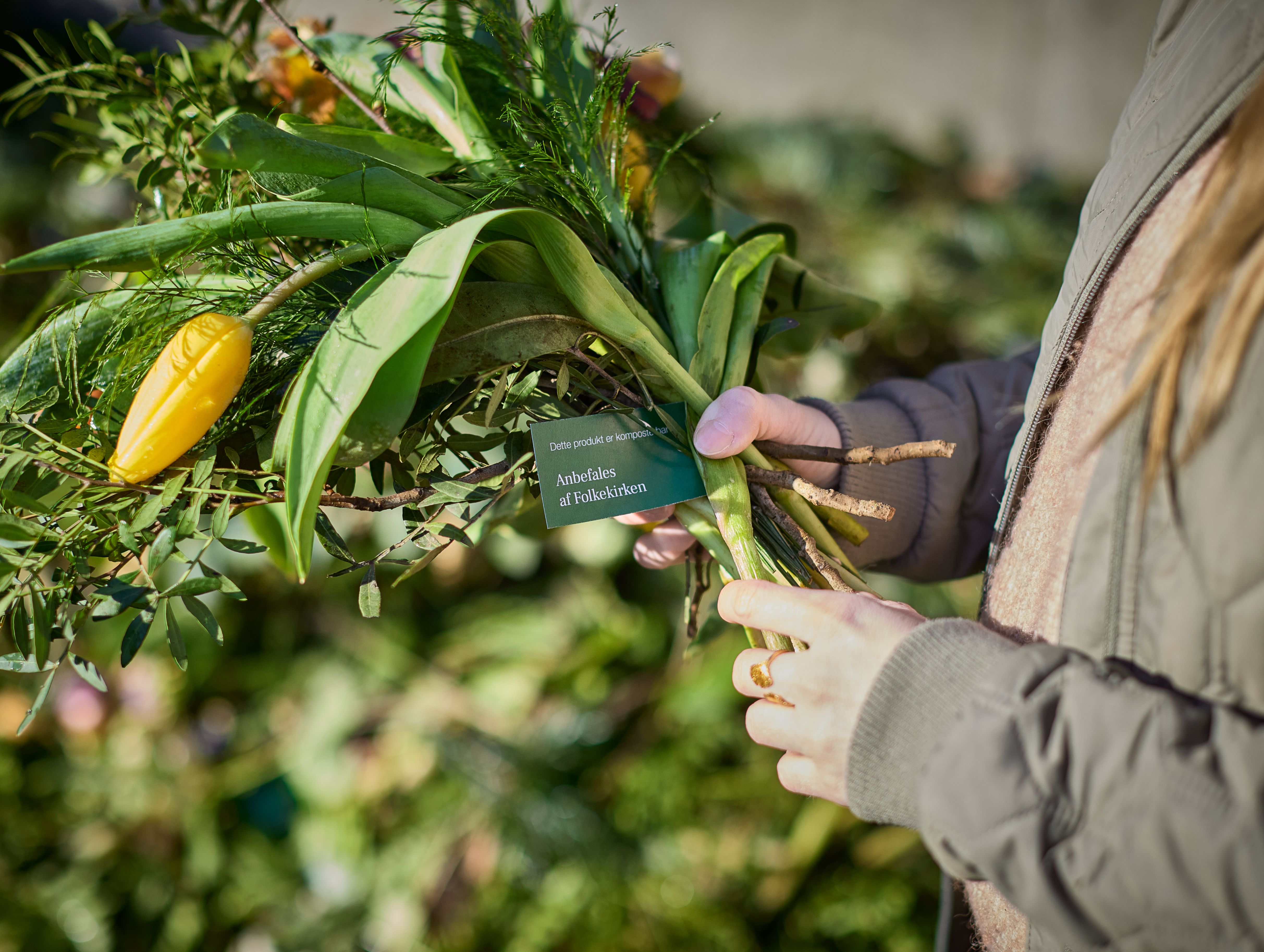 Blomsterhandler med buket